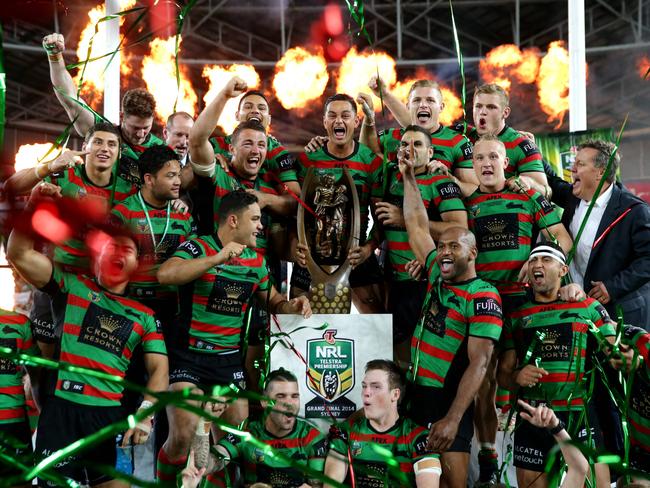 John Sutton and his Rabbitoh team mates celebrate their 2014 NRL Grand Final win over the Bulldogs at ANZ Stadium. Picture: Gregg Porteous