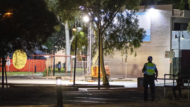 A police officer spots young local children on the streets of Alice Springs at night before giving chase. Picture: Mark Brake