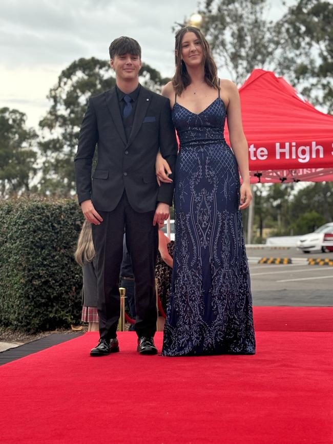 Students from Urangan State High School arrive at their formal.