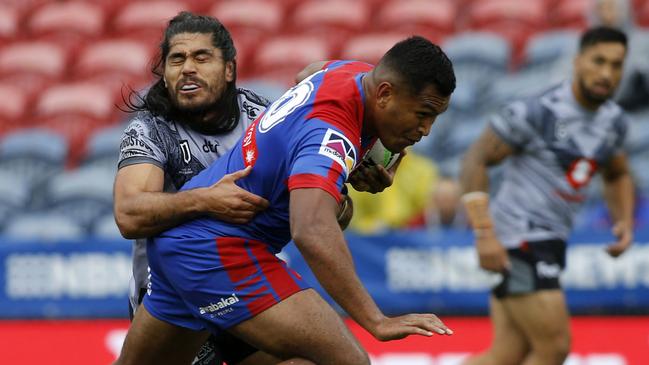 Daniel Saifiti of the Knights surges in for a first-half try during the round-one NRL match between Newcastle and the New Zealand Warriors at McDonald Jones Stadium in Newcastle on Saturday. Picture: AAP