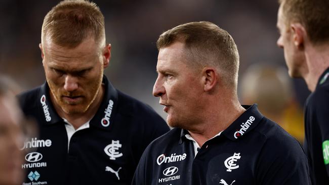 MELBOURNE, AUSTRALIA - MARCH 20: Michael Voss, Senior Coach of the Blues looks on during the 2025 AFL Round 02 match between the Carlton Blues and the Hawthorn Hawks at the Melbourne Cricket Ground on March 20, 2025 in Melbourne, Australia. (Photo by Michael Willson/AFL Photos via Getty Images)