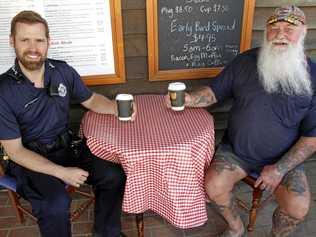 CHAT TIME: Hamish of Lowood enjoys a cup of coffee and a chat with Constable David Jessup at a previous Coffee With a Cop event. Picture: Dominic Elsome