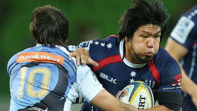 Sias Ebersohn of the Force tackles Rebels hooker Shota Horie.