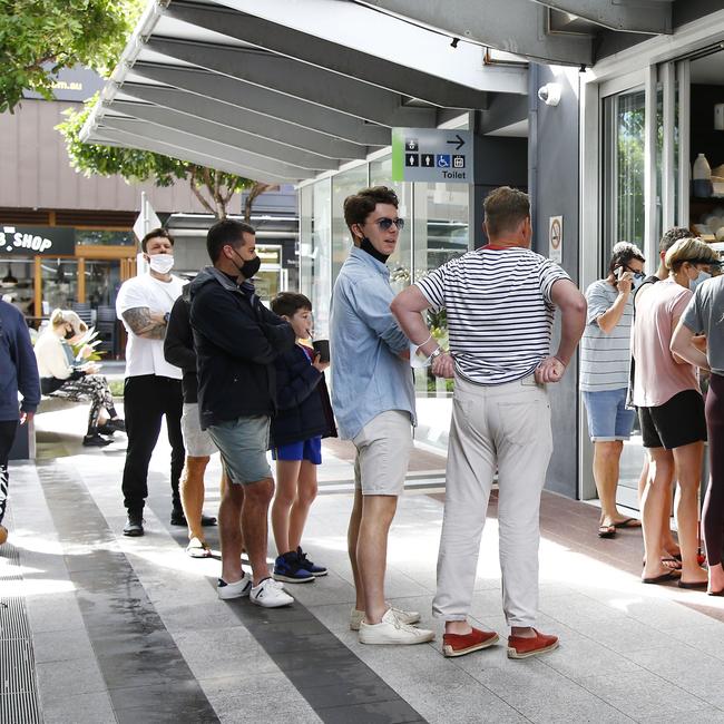 Day 2 in lockdown. Members of the public line up to get coffee in Broadbeach. Picture: Tertius Pickard