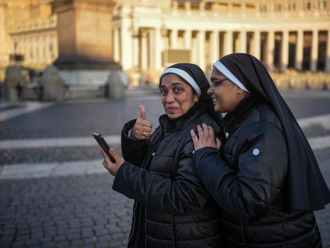 A nun gives a thumbs up in St Peter's Square in Vatican City. Picture: Getty Images