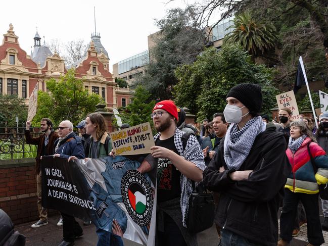 Crowds march as academic misconduct meetings begin over the encampment and sit-in. Picture: Jason Edwards