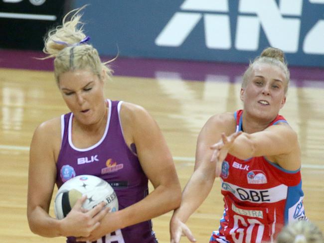 Gretel Tippett and Maddy Turner contest the ball. Picture: Jono Searle.