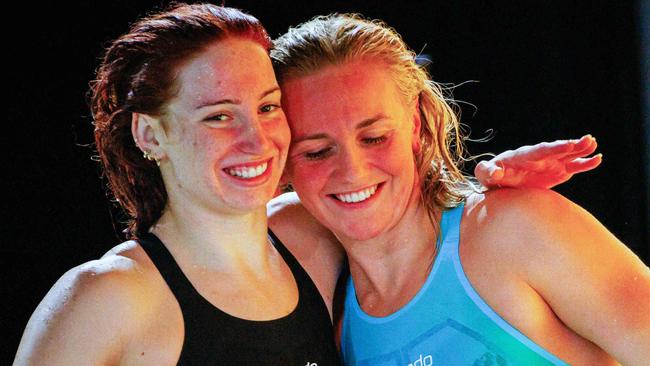 Australiaâs Ariarne Titmus (R) and compatriot Mollie OâCallaghan react after Titmus won the womenâs 200m freestyle final in a new world record time, while OâCallaghan also went under her previous world record to finish second, during the Australian Swimming Trials at the Brisbane Aquatic Centre on June 12, 2024. (Photo by Patrick HAMILTON / AFP) / -- IMAGE RESTRICTED TO EDITORIAL USE - STRICTLY NO COMMERCIAL USE --