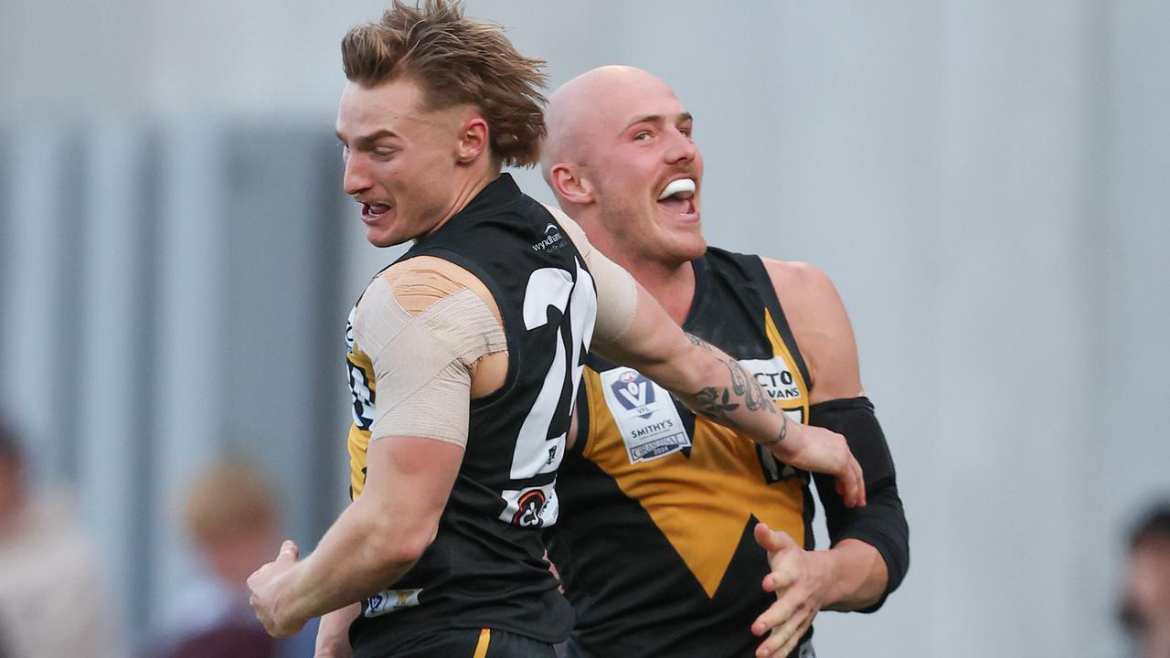 Lions land rival tall, VFL flag goalsneak in double coup