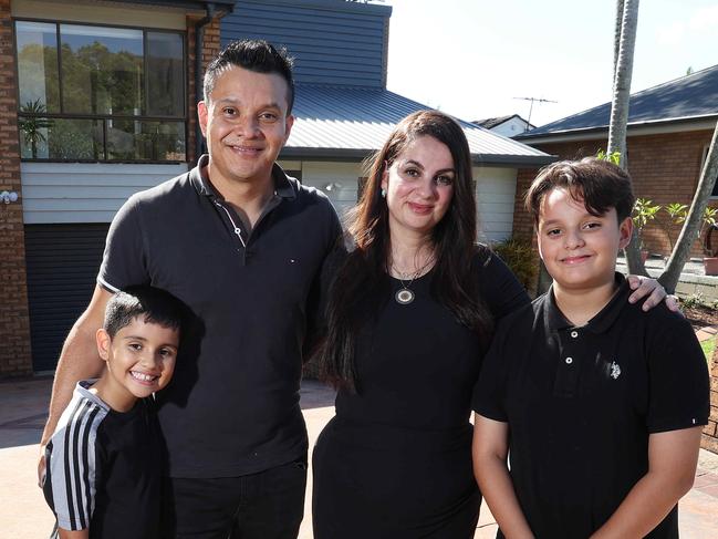 Johnny and Surra Serrano with two of their kids Zane, 11, and Ali, 7, at their Middle Park which is for sale. Picture: Liam Kidston