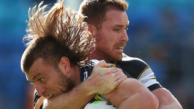 Gold Coast forward Jai Arrow – and his mullet – has been terrorising defenders all year. Picture: Chris Hyde/Getty Images