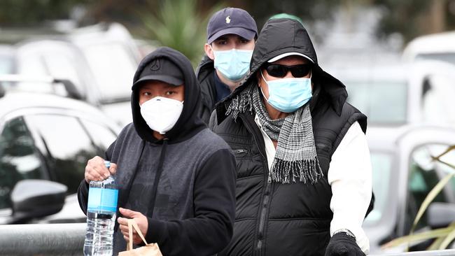 People wait for a walk-up COVID-19 test in Auckland, New Zealand. Picture: Fiona Goodall/Getty Images