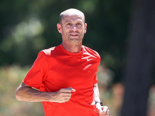 Marathon legend Steve Moneghetti running alongside Emus at Ballarat Wildlife Park to promote Herald Sun/Transurban Run for the Kids early bird offer.                     Picture: David Caird