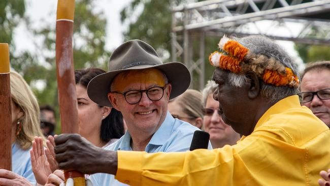 Gumatj clan dancers perform bunggul (ceremonial dance) for Anthony Albanese, before presenting him with a Bathi at this year’s GARMA opening ceremony. Picture: Nina Franova