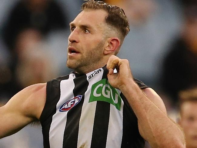 Hawthorn v Collingwood Travis Cloke pulls his Collingwood jumper after kicking a goal 4th term Picture:Wayne Ludbey