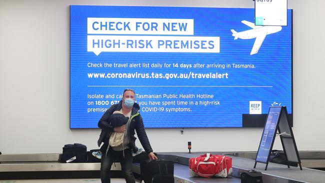 Melbourne flight arrivals at Hobart International Airport after a lockdown was announced in Victoria. Picture: Nikki Davis-Jones