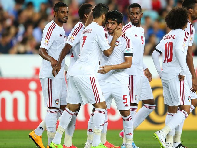 SYDNEY, AUSTRALIA - JANUARY 23: Ali Mabkhout of the United Arab Emirates celebrates with team mates after scoring a goal during the 2015 Asian Cup Quarter Final match between Japan and the United Arab Emirates at ANZ Stadium on January 23, 2015 in Sydney, Australia. (Photo by Brendon Thorne/Getty Images)