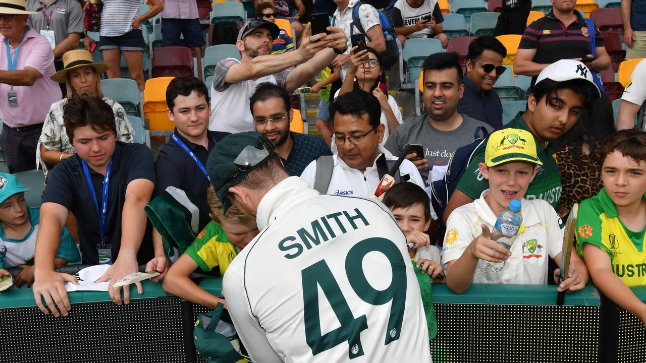 Steve Smith with fans at the Gabba.