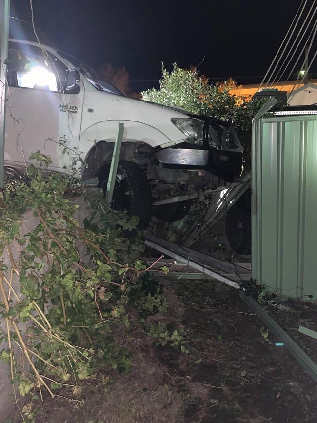 A stolen Toyota Hilux ploughed into the fence of Wyong Fire Station.