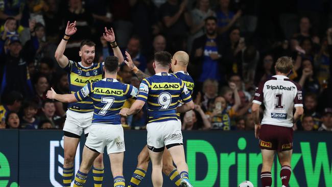 Parramatta's Clint Gutherson celebrates after scoring a try during the Parramatta v Manly NRL match at Bank West Stadium, Parramatta. Picture: Brett Costello