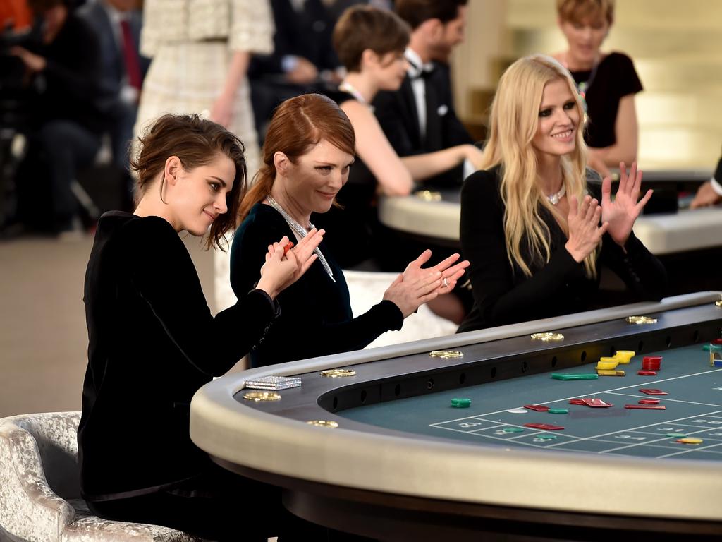 Kristen Stewart, Julianne Moore and Lara Stone attend the Chanel show as part of Paris Fashion Week. Picture: Getty