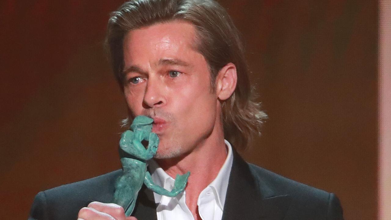 LOS ANGELES, CALIFORNIA - JANUARY 19: Brad Pitt accepts the awards for Outstanding Performance by a Male Actor in a Supporting Role for "Once Upon A Time In Hollywood" onstage during the 26th Annual Screen Actors Guild Awards at The Shrine Auditorium on January 19, 2020 in Los Angeles, California.   Rich Fury/Getty Images/AFP == FOR NEWSPAPERS, INTERNET, TELCOS & TELEVISION USE ONLY ==