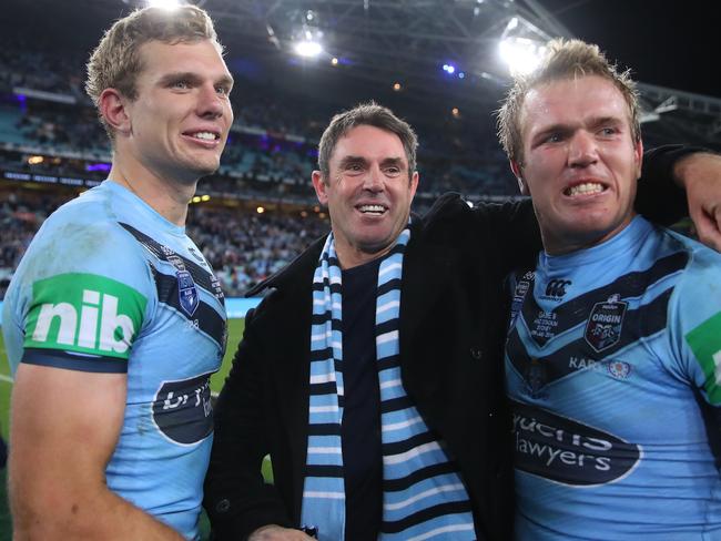 SYDNEY, AUSTRALIA - JULY 10:  Blues coach Brad Fittler celebrates with Tom Trbojevic of the Blues and Jake Trbojevic of the Blues after winning game three of the 2019 State of Origin series between the New South Wales Blues and the Queensland Maroons at ANZ Stadium on July 10, 2019 in Sydney, Australia. (Photo by Cameron Spencer/Getty Images)