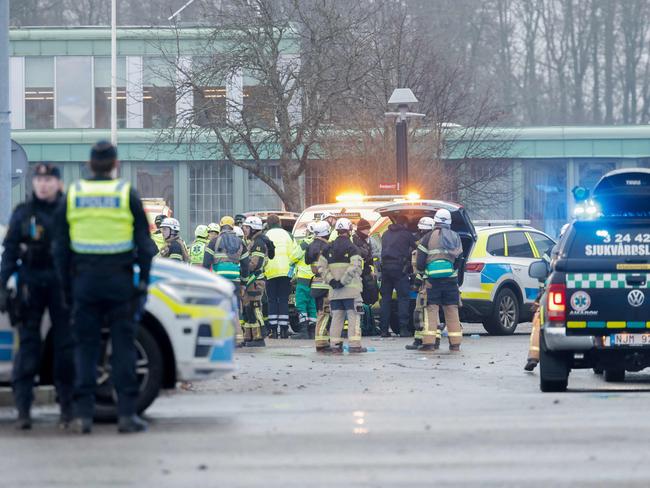 Members of the emergency services work at the scene of the Risbergska School in Orebro, Sweden. Picture: AFP