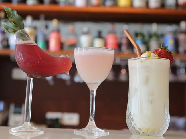 Cocktails will feature Australian native ingredients, including the Rosella’s signature cocktail (left) with rosella jam and lilly pilly leaves. Picture Glenn Hampson