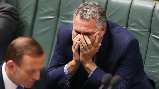 Have you seen the latest budget forecasts? Oh my ... The Prime Minister Tony Abbott with The Treasurer Joe Hockey, during Question Time in the House of Representatives in Parliament House Canberra.