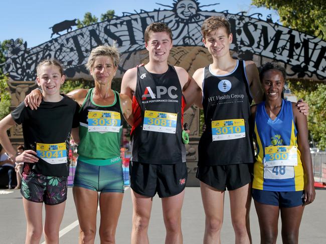 Race to the Taste men's and women's 3km event place getters, from left, Jessica Smith, 11, (3rd), Francesca Smith (2nd), Jamie Laurence (2nd), Rob Elkerton (1st) and Metasebia Duggan (1st). Picture: SUPPLIED
