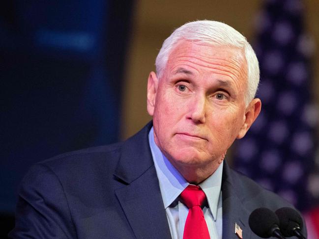 (FILES) In this file photo taken on April 12, 2022 former US Vice President Mike Pence speaks at a campus lecture hosted by Young Americans for Freedom at the University of Virginia in Charlottesville, Virginia. - Pence said on March 11, 2023 that history would hold former president Donald Trump 