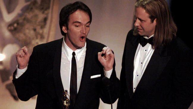 Quentin Tarantino with Roger Avary accepting the Academy Award for Pulp Fiction.