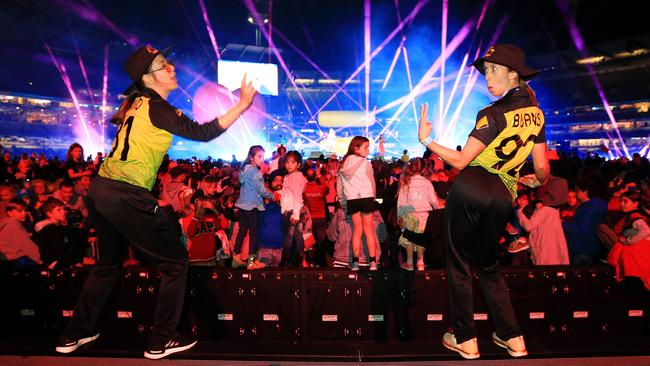 Molly Strano and Erin Burns dance to Katy Perry at the 2020 ICC Women's T20 World Cup final at the MCG between Australia and India. Picture: Mark Stewart