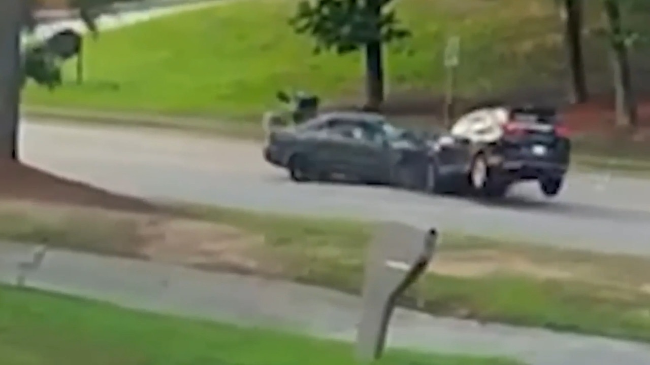 Moment husband allegedly tries to kill wife
