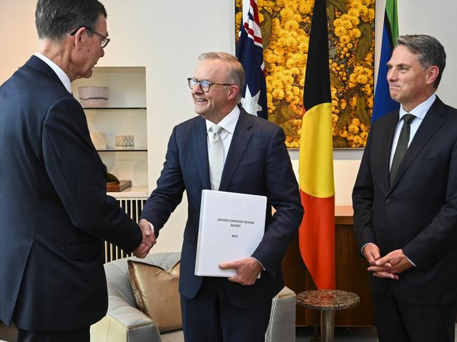 CANBERRA, AUSTRALIA - FEBRUARY 14: Sir Angus Houston delivers the Defence Strategic Review 2023 to Prime Minister Anthony Albanese and Deputy PM and Minister of Defence Richard Marles at Parliament House on February 14, 2023 in Canberra, Australia.  (Photo by Martin Ollman/Getty Images)