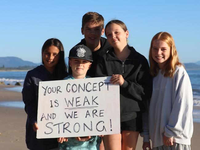 Members of the public took part in a paddle-out at Byron Bay's Main Beach to protest against the planned Netflix reality show Byron Baes on the morning of Tuesday, April 20, 2021. Picture: Liana Boss