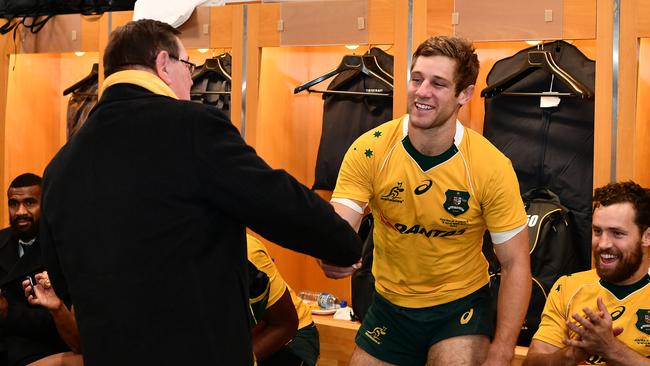 Kyle Godwin of Australia is presented with his debut cap following the win over France