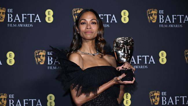 Zoe Saldana poses with Supporting Actress Award for Emilia Perez. Picture: Kate Green/Getty Images