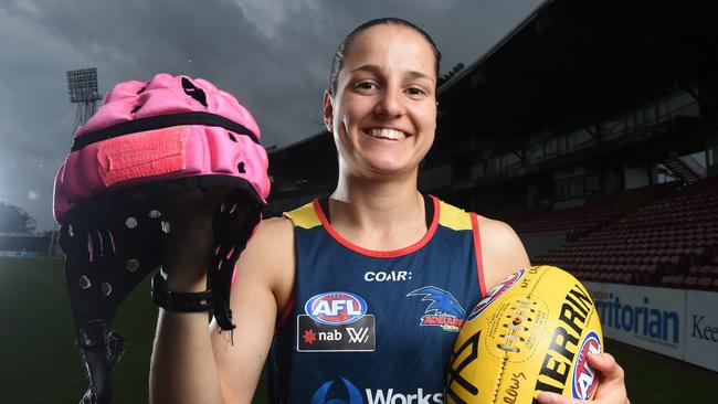 Adelaide Crows footballer Heather Anderson has been given permission to wear a pink helmet during the football games.