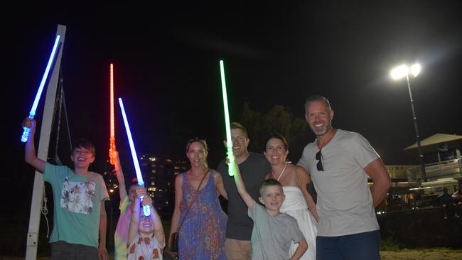 Sarah Heron, Erin Macvicar, Andrew Macvicar, Rhys Heron and children celebrating New Year's Eve 2022 at Mooloolaba. Photo: Elizabeth Neil