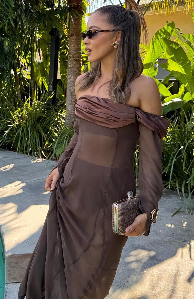 Aussie model Olivia Molly Rogers caused a stir when she wore a brown translucent dress to her friend’s wedding. Picture: Instagram/@oliviamollyrogers