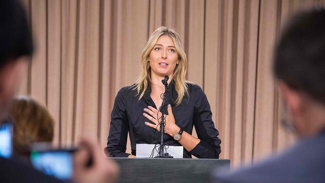 (FILES) This file photo taken on March 07, 2016 shows Russian tennis player Maria Sharapova speaking during a press conference in Los Angeles. Russian tennis star Maria Sharapova has been banned for two years after failing a drug test, the International Tennis Federation (ITF) announced on June 8, 2016. Sharapova tested positive for the controversial banned medication meldonium during January's Australian Open. / AFP PHOTO / ROBYN BECK