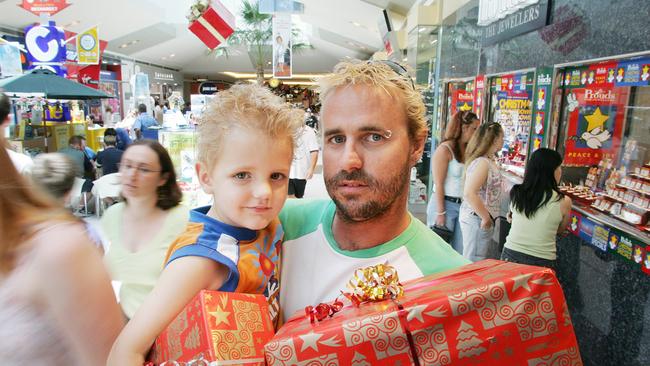 Jason Baker and his son Ty, 4, Christmas shopping in 2005.