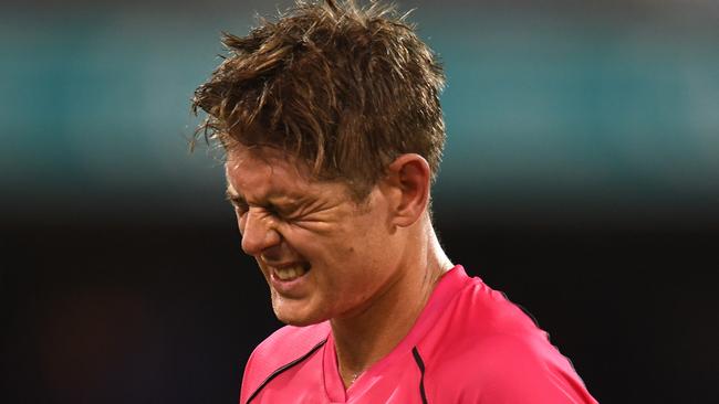 Sydney Sixers player Daniel Hughes reacts after being dismissed during the Big Bash League semi final.