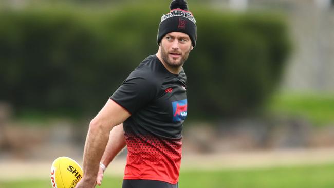 Tom Bellchambers of the Bombers runs with the ball during an Essendon Bombers training session at the Hangar in Tullamarine, Melbourne, Wednesday, August 7, 2019. (AAP Image/Scott Barbour) NO ARCHIVING