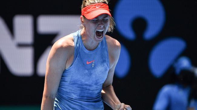 Maria Sharapova celebrates after winning a big point.