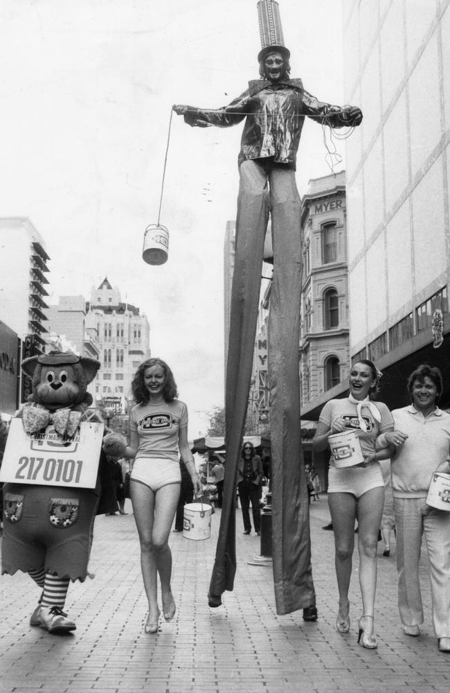 In Rundle Mall promoting the 1981 Channel 10 Christmas Appeal was Fat Cat, Mandy Croft, Clap the Clown, Debera Betty and singer Normie Rowe.