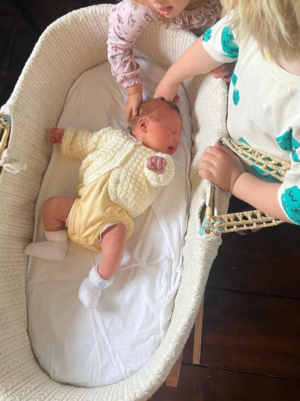 The couple’s older children with their new sister. Picture: Carrie Johnson/Instagram