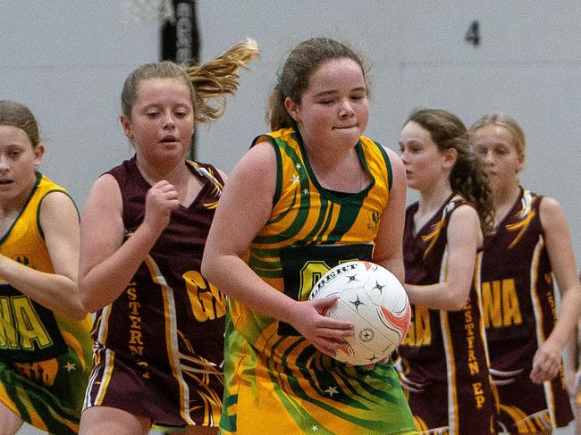 ADELAIDE, AUSTRALIA - NewsWire Photos - JUNE 27, 2023: SA Country Netball, Western Eyre Penninsula (Brown) v Port Pirie (Yellow) (Div 4), at Netball SA Stadium, Mile End. Picture: NCA NewsWire / Emma Brasier